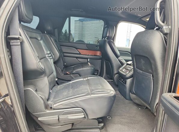 5LMJJ3HT7KEL09870 2019 LINCOLN NAVIGATOR Черный Вид задней части салона