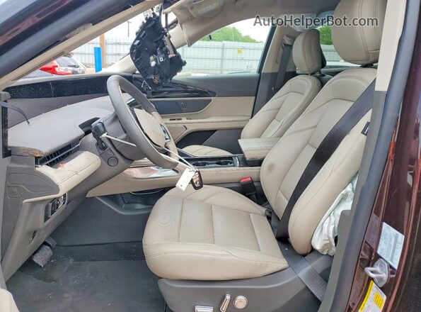 5LMPJ8JA2SJ969855 2025 LINCOLN NAUTILUS Maroon Vista interior delantera