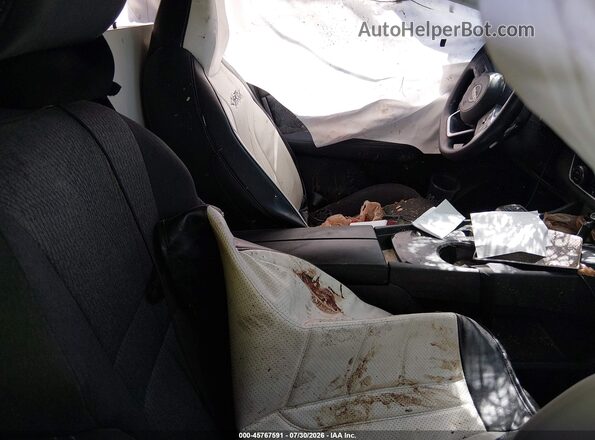 5N1BT3BA9RC743688 2024 NISSAN ROGUE Коричневый Вид салона спереди