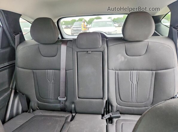 5NMJB3AE7PH233202 2023 HYUNDAI TUCSON White Vista de los asientos traseros
