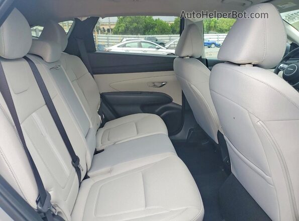 5NMJB3DE0TH609129 2026 HYUNDAI TUCSON Gray Rear seats view