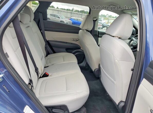 5NMJB3DE2TH633304 2026 HYUNDAI TUCSON White Rear interior view