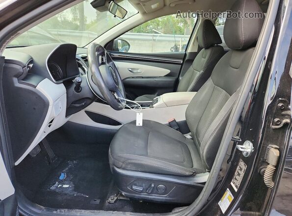 5NMJB3DE4RH299690 2024 HYUNDAI TUCSON Black Front interior view