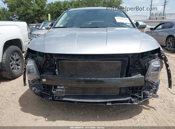 5NMJB3DEXSH559659 2025 HYUNDAI TUCSON Серебряный Вид задней части салона