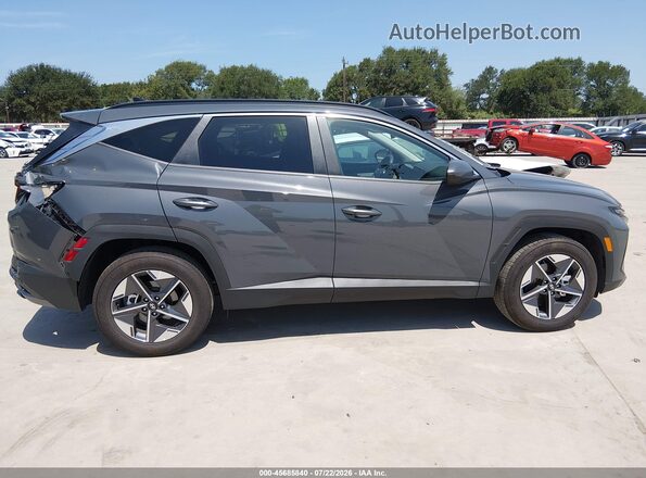 5NMJB3DEXTH703079 2026 HYUNDAI TUCSON Gray Rear interior view