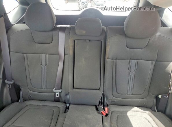 5NMJBCDE2TH725920 2026 HYUNDAI TUCSON Red Rear seats view