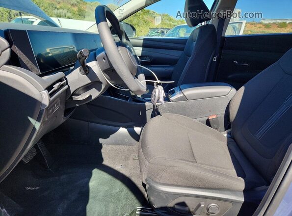 5NMJBCDEXTH687109 2026 HYUNDAI TUCSON Blue Front interior view