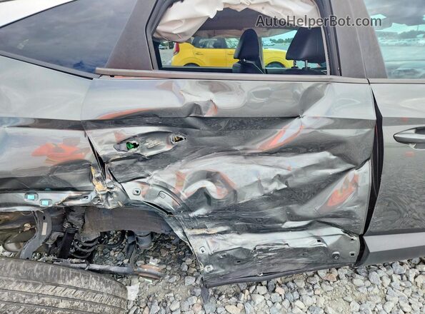 5NMJC3AE1NH009997 2022 HYUNDAI TUCSON Gray Rear seats view