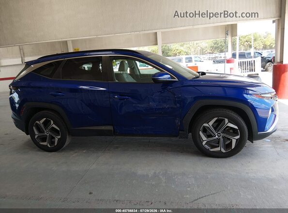5NMJC3AE8NH122622 2022 HYUNDAI TUCSON Blue Vista interior trasera
