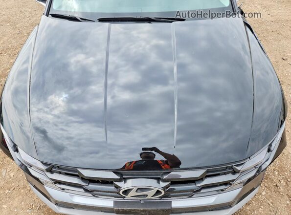 5NMJC3DE4TH616338 2026 HYUNDAI TUCSON Black Widok komory silnika