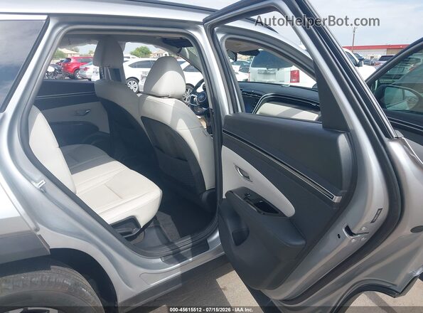 5NMJCCAE7NH017716 2022 HYUNDAI TUCSON Silver VIN კოდის სტიკერის ხედი