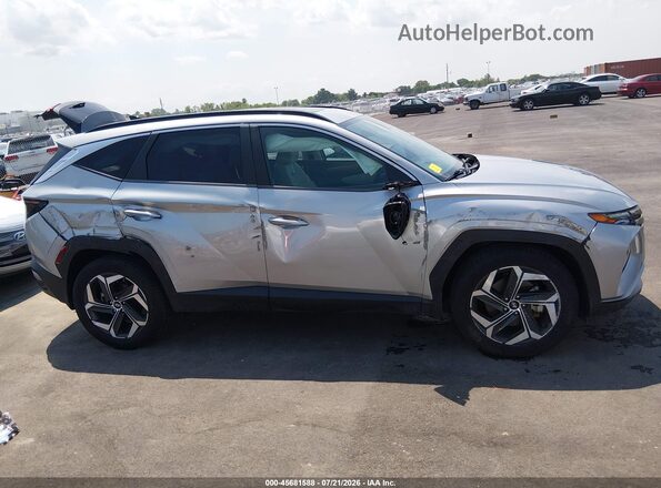 5NMJCCAEXNH038060 2022 HYUNDAI TUCSON Silver Вид задньої частини салону