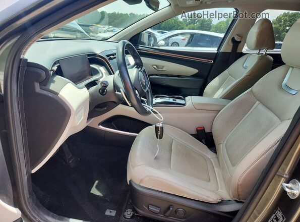 5NMJE3AE3NH103017 2022 HYUNDAI TUCSON Green Front interior view