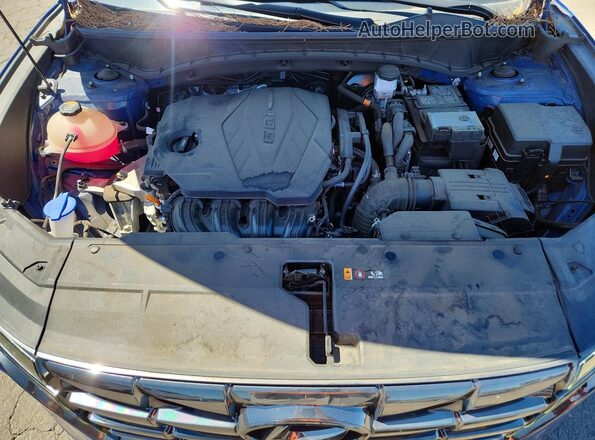 5NMJECAE0PH229614 2023 HYUNDAI TUCSON Blue Вид задньої частини салону