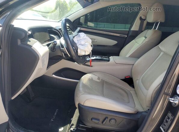 5NMJECAE9PH210754 2023 HYUNDAI TUCSON Серебряный Вид салона спереди
