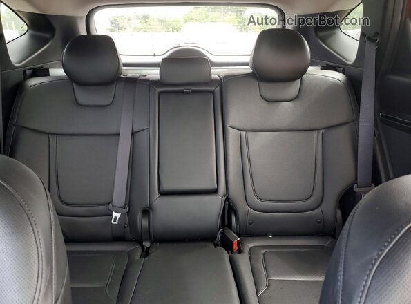 5NMJFCAE2PH174273 2023 HYUNDAI TUCSON Red Vista de los asientos traseros