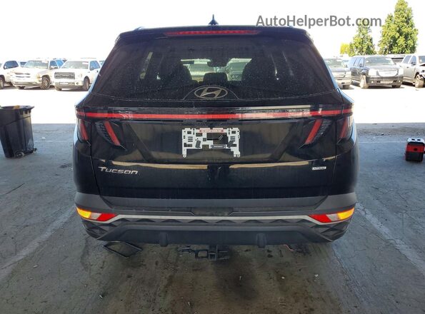 5NMJFCAE8NH074899 2022 HYUNDAI TUCSON Black Rear view