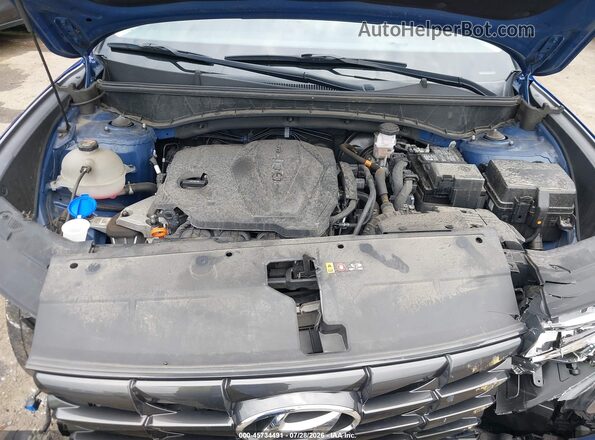 5NMJFCAEXNH105859 2022 HYUNDAI TUCSON Blue უკანა ხედი
