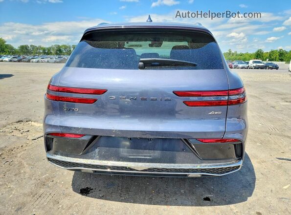 5NMMBDTB5TH056679 2026 GENESIS GV70 Gray Vista trasera