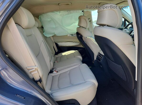 5NMMBDTB5TH056679 2026 GENESIS GV70 Gray Vista interior trasera