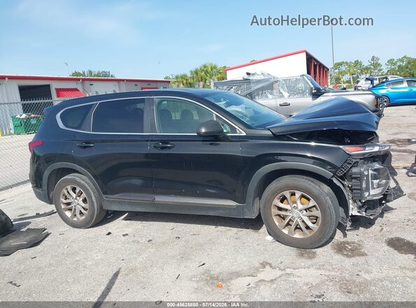 5NMS23AD8KH074565 2019 HYUNDAI SANTA FE Black Rear interior view