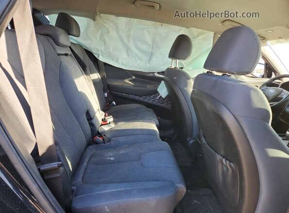 5NMS2CAD6KH029012 2019 HYUNDAI SANTA Black Vista interior trasera