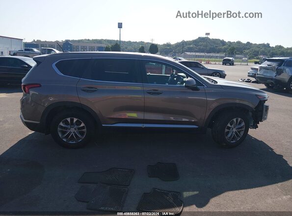 5NMS2CADXKH129033 2019 HYUNDAI SANTA FE Бежевый Вид задней части салона