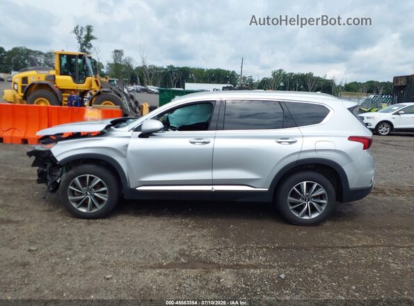 5NMS3CAD2KH023947 2019 HYUNDAI SANTA FE Silver Rear interior view
