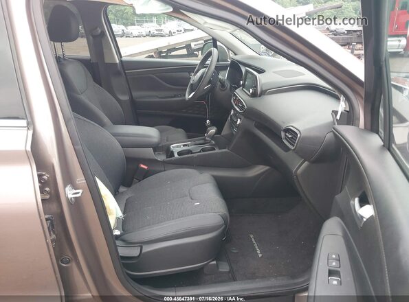 5NMS3CAD7KH005637 2019 HYUNDAI SANTA FE Brown Front interior view