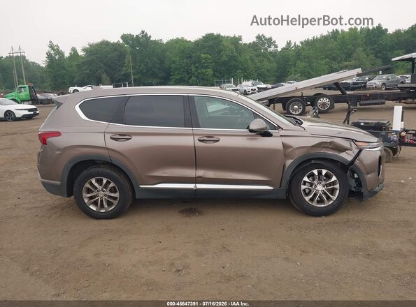 5NMS3CAD7KH005637 2019 HYUNDAI SANTA FE Brown Rear interior view