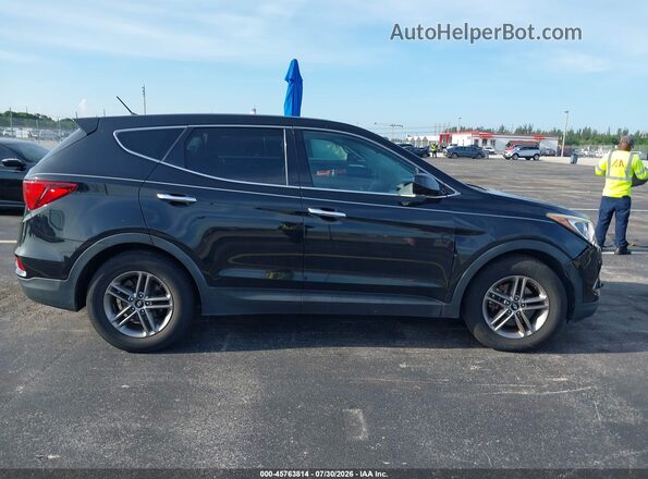5NMZT3LB2JH080951 2018 HYUNDAI SANTA FE SPORT Black Rear interior view
