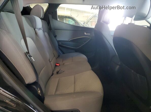 5NMZTDLB2HH023083 2017 HYUNDAI SANTA Charcoal Widok wnętrza z tyłu
