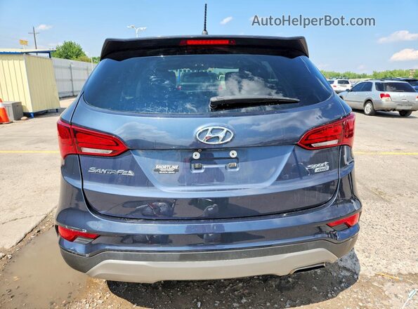 5NMZTDLB9JH069502 2018 HYUNDAI SANTA Blue უკანა ხედი