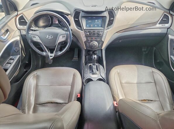 5NMZU3LB6HH002924 2017 HYUNDAI SANTA Beige Vista del salpicadero