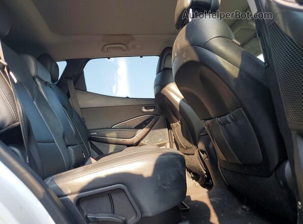 5NMZUDLB0JH055839 2018 HYUNDAI SANTA White Widok wnętrza z tyłu