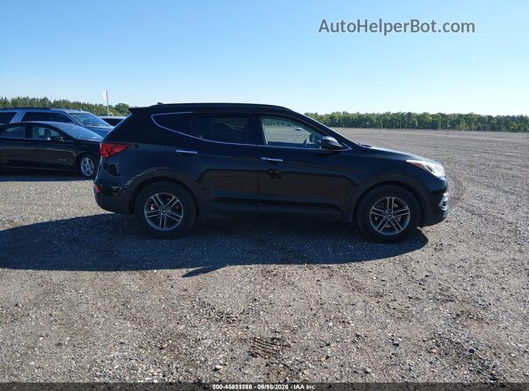 5NMZUDLB3JH095011 2018 HYUNDAI SANTA FE SPORT Black Rear interior view