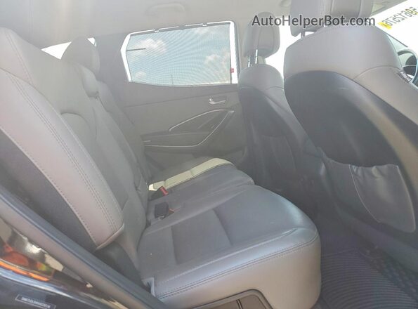5NMZUDLB4HH028556 2017 HYUNDAI SANTA Black Widok wnętrza z tyłu