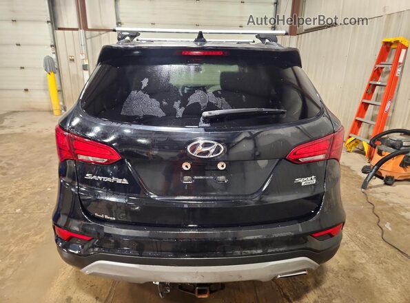 5NMZUDLB8HH022629 2017 HYUNDAI SANTA Black Rear view