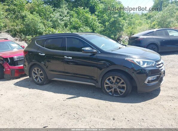 5NMZW4LA3HH043115 2017 HYUNDAI SANTA FE SPORT Черный Вид задней части салона