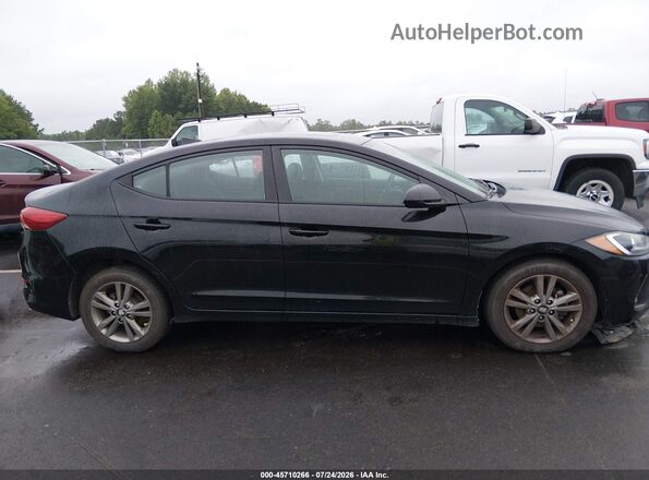 5NPD84LF0JH296028 2018 HYUNDAI ELANTRA Black Rear interior view