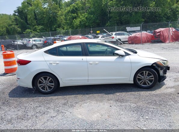 5NPD84LF4JH380319 2018 HYUNDAI ELANTRA White Rear interior view