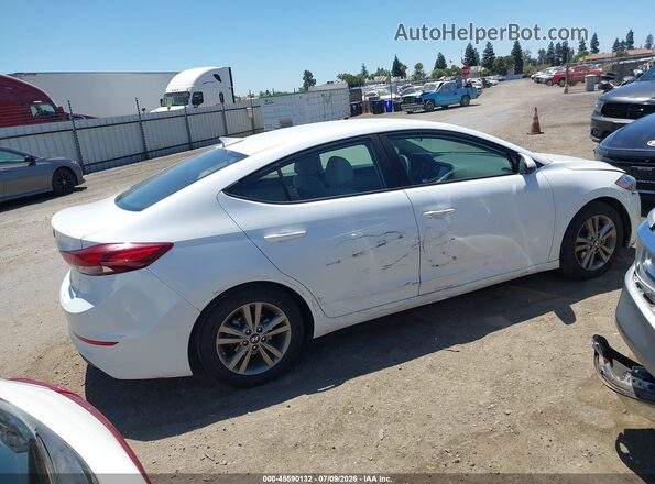 5NPD84LF5JH388588 2018 HYUNDAI ELANTRA White Rear interior view
