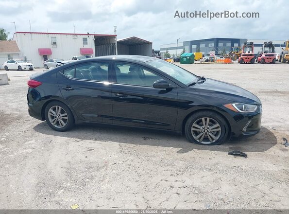 5NPD84LF9JH360390 2018 HYUNDAI ELANTRA Black Rear interior view