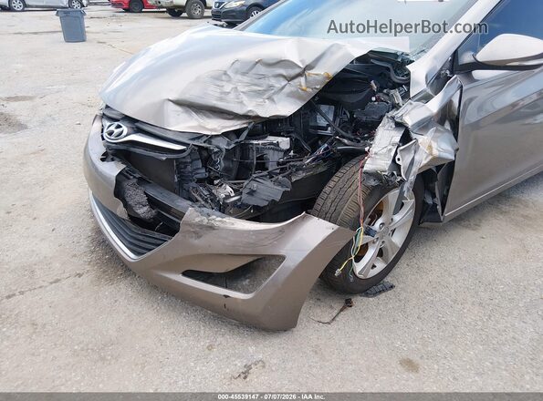 5NPDH4AEXGH774040 2016 HYUNDAI ELANTRA Золотой Вид спереди