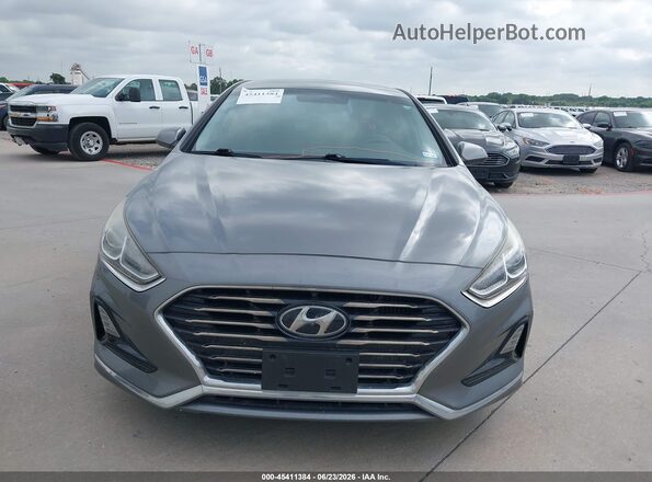 5NPE24AA8KH774517 2019 HYUNDAI SONATA Silver Rear interior view