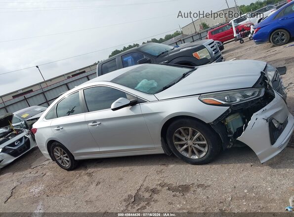 5NPE24AF0KH804993 2019 HYUNDAI SONATA Серебряный Вид задней части салона