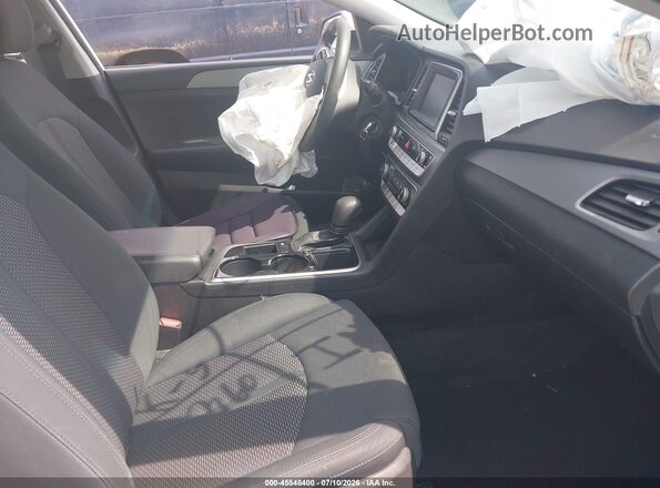 5NPE24AF8KH755994 2019 HYUNDAI SONATA White Widok wnętrza z przodu