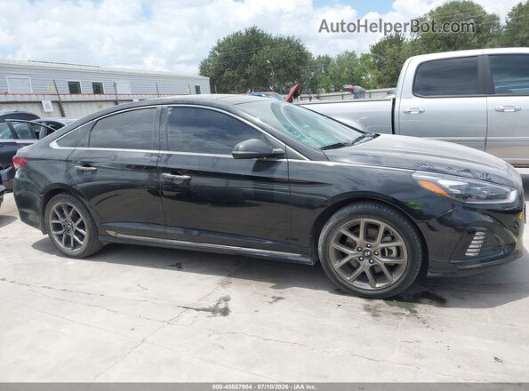 5NPE34AB4KH773256 2019 HYUNDAI SONATA Black Widok wnętrza z tyłu
