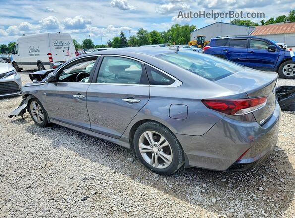 5NPE34AF0JH724086 2018 HYUNDAI SONATA Gray Trasero izquierdo