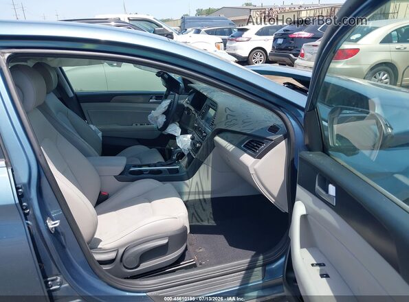 5NPE34AF1HH585533 2017 HYUNDAI SONATA Gray Vista interior delantera